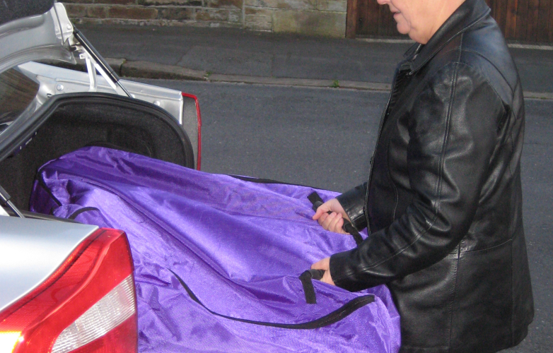 Wheelchair bag loading into a car boot
