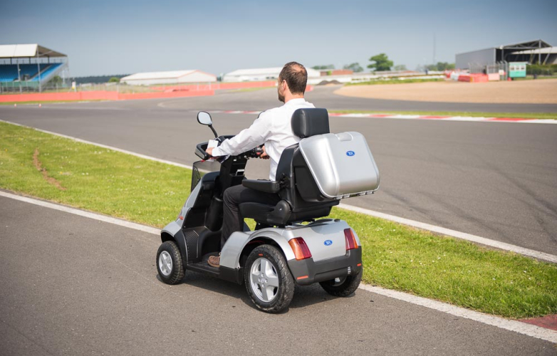 Mobility scooter user at Mobility Scooter at Silverstone