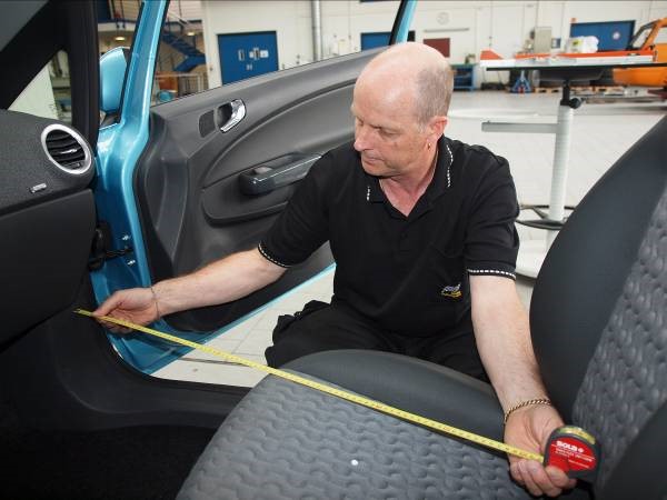 Measuring seat position in a car