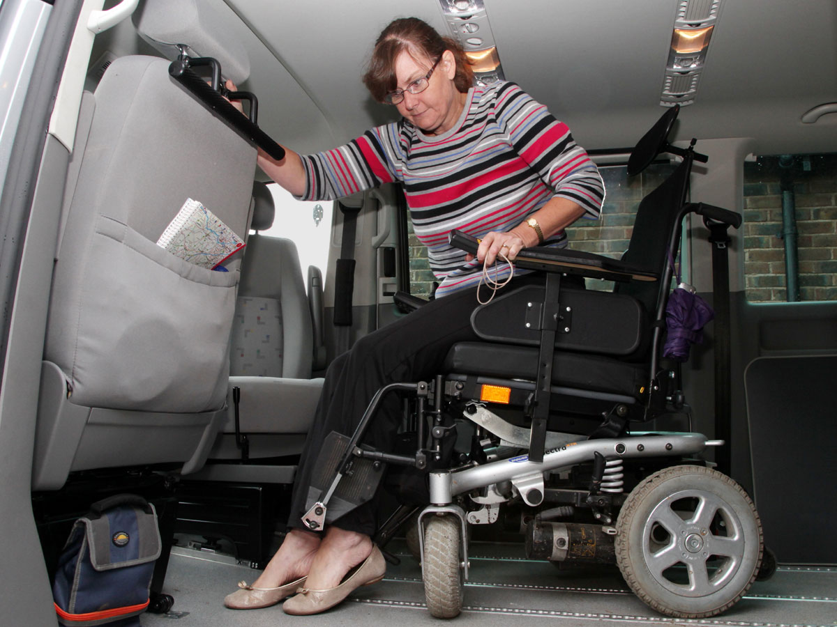 WAV user transferring inside to a swivel seat
